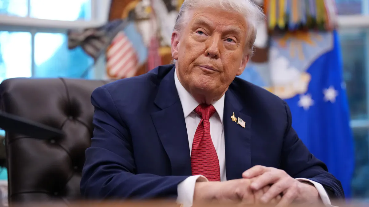President Donald Trump sits in the Oval Office of the White House on Sept. 25, 2025, in Washington, D.C.